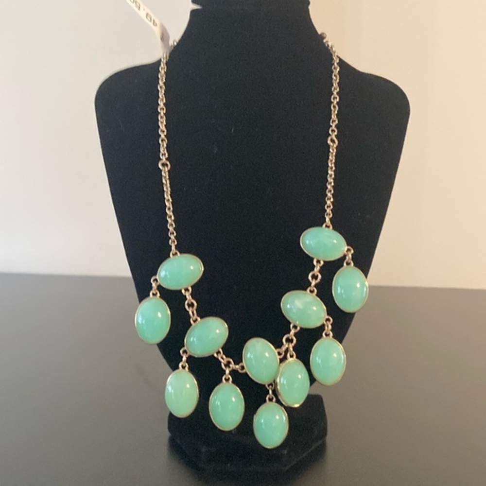 Macy's Gold Necklace with Green Stones reversible With clear stones on back.